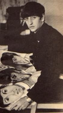Ringo Starr and a drawing of the Beatles